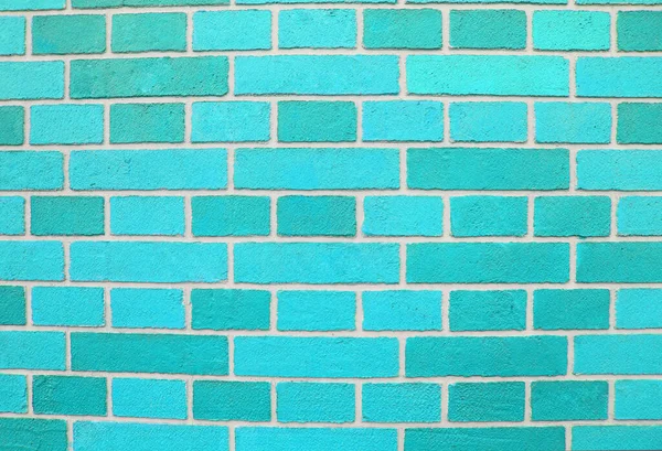 Abstract blue brick wall texture depicting in paint colors on an old brick wall. blue brick wall background pattern. Painted brick wall in blue empty space for your design