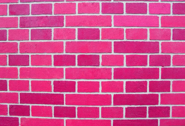 Streszczenie różowa cegła ściany tekstury przedstawiające w kolorach farby na starej ścianie z cegły. różowy ceglany wzór tła ściany. Pomalowana ceglana ściana w różowym pustym miejscu dla Twojego projektu — Zdjęcie stockowe