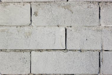 Soyut beyaz tuğla duvar dokusu eski tuğla bir duvarda boya renkleriyle tasvir ediliyor. beyaz tuğla arka plan deseni. 