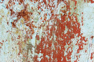 Detaylı paslanma, pas ve çizikler ile desenli metal yüzey. Paslı metal duvar, pas desenli boyanmış metal. Paslı metal arka planda pas izleri var. Pas lekeleri. Metal yüzey