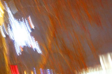 Psikedelik gradyan parlak kırmızı, turuncu, sarı renkler koyu arkaplanda. Soyut şablon ögesi görünümsüz desen. Geçmişi. Soyut beyaz ve renk gradyan gözlük parametrik iç