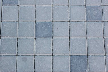 Zemin, duvar ya da patika için beton ya da kaldırım taşı veya taş levhaları. Geleneksel çit, mahkeme, arka bahçe ya da yol kaldırımı.