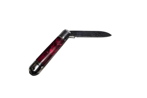 Kırmızı ve kestane rengi saplı küçük keskin metal jilet.