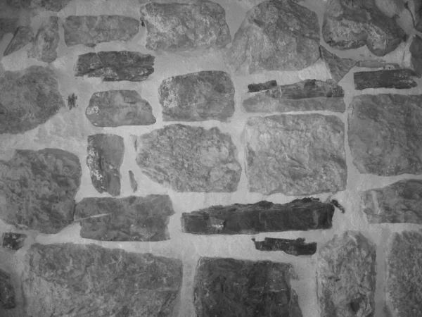 Stone Wall Castle Primer plano. Es pared áspera de piedra para el patrón y el fondo — Foto de Stock