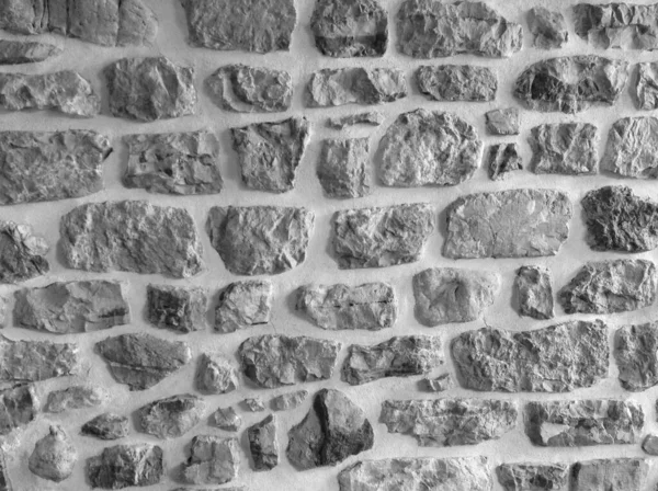 Steinmauer Burg Nahaufnahme. Es ist Stein raue Wand für Muster und Hintergrund — Stockfoto