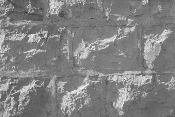 Stone Wall Castle Primer plano. Es pared áspera de piedra para el patrón y el fondo —  Fotos de Stock