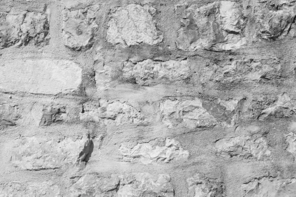 Steinmauer Burg Nahaufnahme. Es ist Stein raue Wand für Muster und Hintergrund — Stockfoto