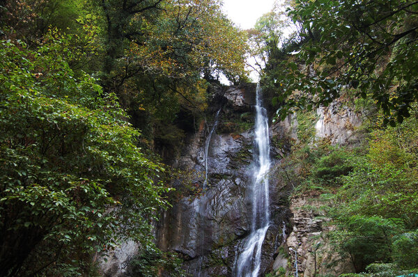 Waterfall in the mountains of Georgia among the greenery
