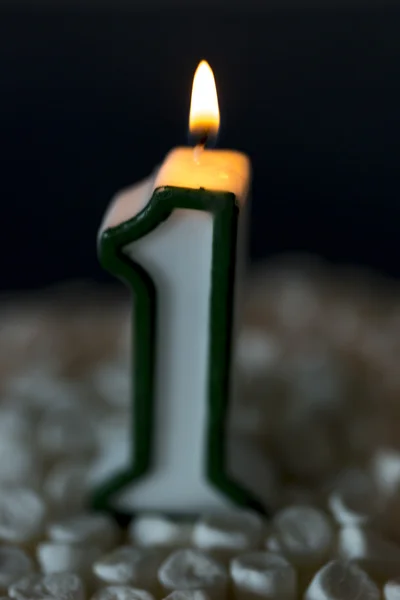Primeiro aniversário vela queimando — Fotografia de Stock