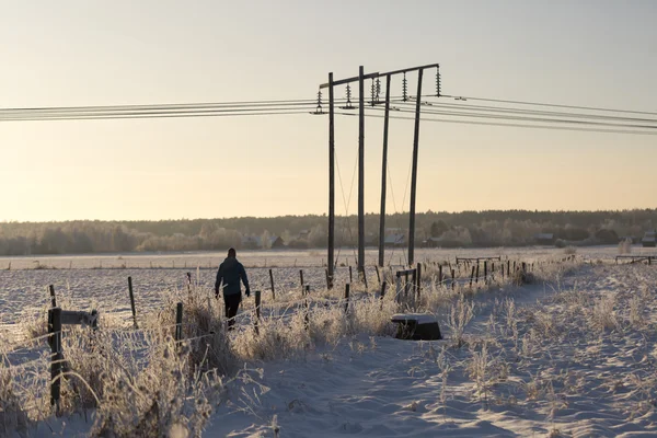 Man Walking in Winter Field — Stock Photo, Image