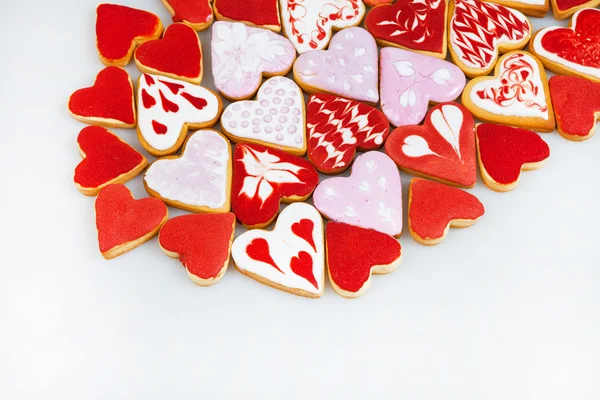 Valentine's day cookies. Heart shaped cookies for valentine's day.Red and Pink Heart Shaped Cookies. Valentine`s Day background. Romantic seamless pattern with cookies hearts. — Stock Photo, Image