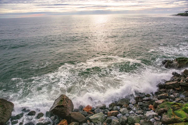 The Pacific Ocean coast in the city of Monterey in California. United States of America. Beautiful beach on a sunny day. Ocean landscape.