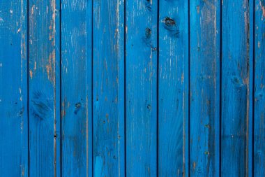 Düğümlü ve tırnak delikli klasik mavi ahşap arka plan dokusu. Eski boyalı ahşap duvar