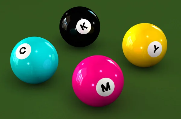 Бильярдные шары на зеленом фоне с буквами CMYK — стоковое фото