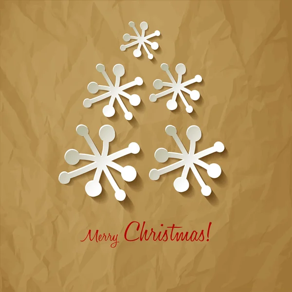 Sněhové vločky vánoční stromeček na zmačkaný papír hnědý pozadí — Stockový vektor