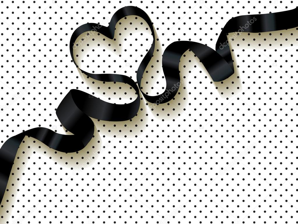 Black ribbon on a polka dots background.