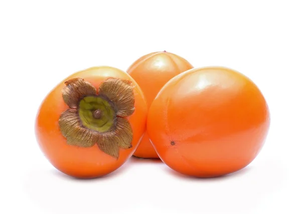 Persimmon vruchten geïsoleerd op witte achtergrond — Stockfoto