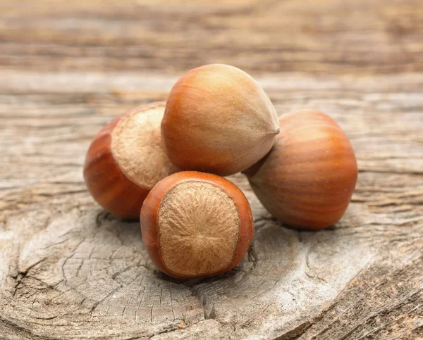 Hazelnuts on wooden background Stock Image