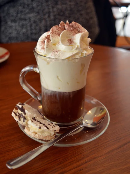 Viennese coffee in glass cup with whipped cream — Stock Photo, Image