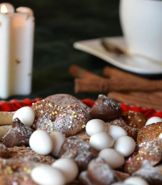 Christmas cookies with cup of black coffee decorated on a table — Stock Photo, Image
