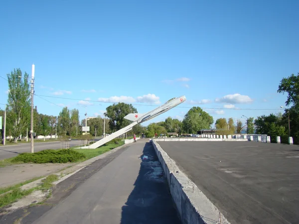 monument to the plane in the city of Dnepropetrovsk on a residential solar array