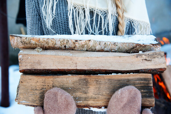Fire wood and old axe. Renewable resource of a energy.