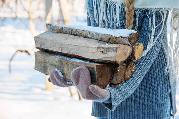 Fire wood and old axe. Renewable resource of a energy.