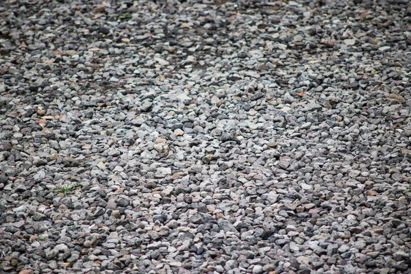 İnşaat Malzemeleri ve Açık Bahçe Kapağı Arkaplanı İçin Ezilmiş Gri Çakıl Taşı DokusuName