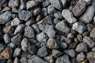 Koyu Gri Ezilmiş Kaya ve Keskin Endüstriyel Çakıl İnşaat ve Otoyol Vakfı için Toplu Taş Döşeme Arkaplanı