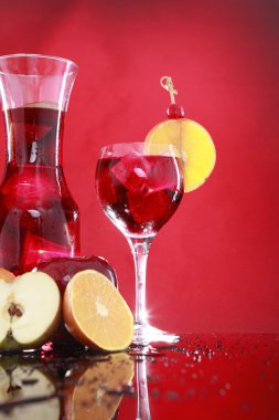 Carafe and sangria in glass clipart