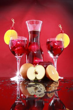 Carafe and sangria in glasses clipart