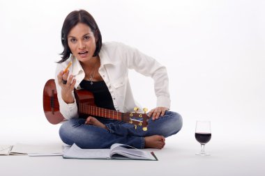 Girl composes music with red wine clipart