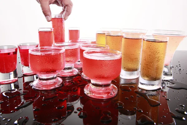 Hand picking drink — Stock Photo, Image