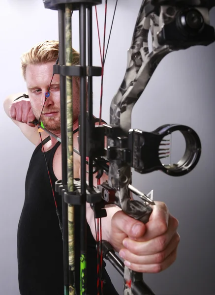 Man hunt with compound bow