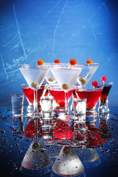 Cocktails glasses on blue — Stock Photo, Image