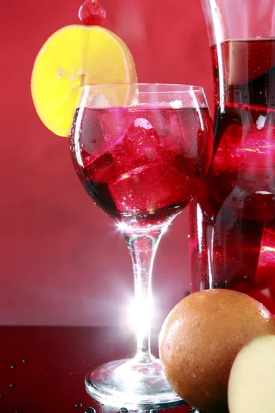 Carafe and sangria in glass — Stock Photo, Image