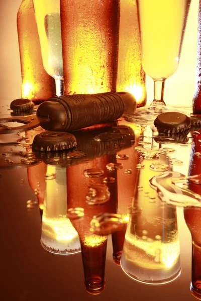 Beer bottles and glasses — Stock Photo, Image