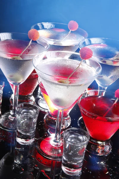 Cocktails glasses on blue — Stock Photo, Image