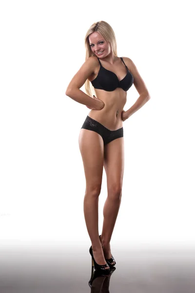 Blonde girl in black lingerie — Stock Photo, Image