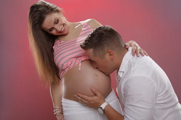 Pregnant girl with her man — Stock Photo, Image