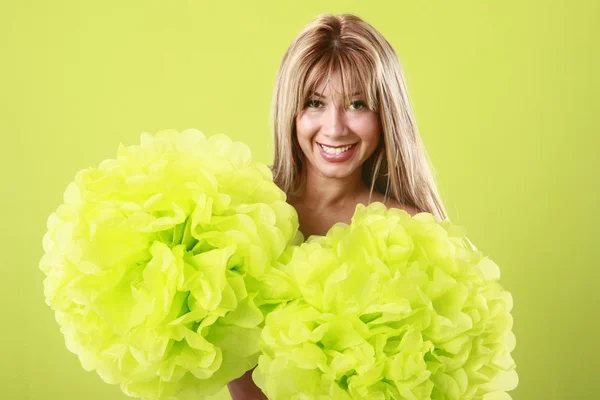 Gelukkig blonde vrouw met pom-poms — Stockfoto