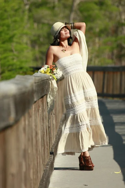 Cute brunette girl on the boardwalk — Stock Photo, Image