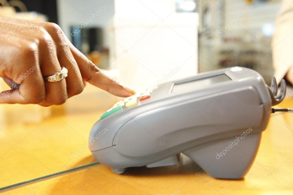 Keying pin numbers on a merchant's transactional terminal