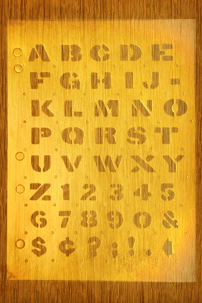 Stenciled alphabet background — Stock Fotó