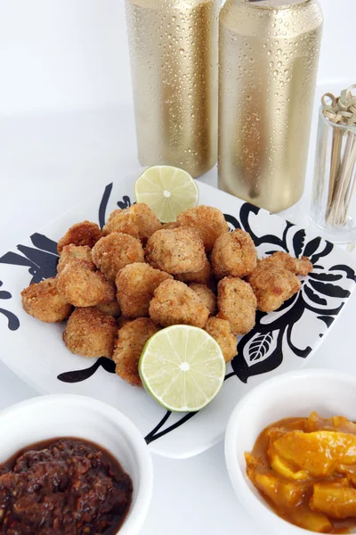 Caribbean breaded conch fitters — Stock Photo, Image