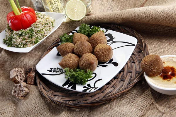 Fried Kibbe with Tabouli and Hummus Tahine — Stock Photo, Image