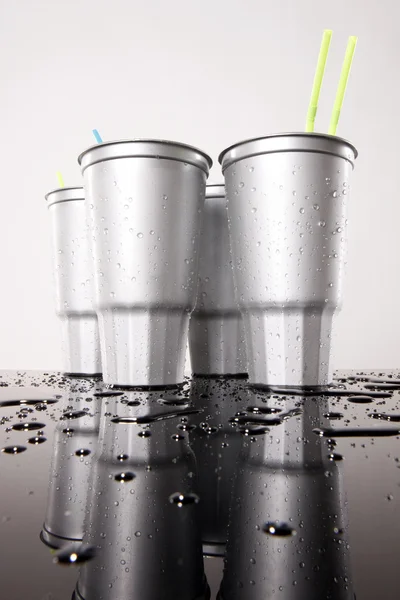 Cold soda in plastic cups