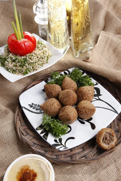 Fried Kibbe with Tabouli and Hummus Tahine — Stock Photo, Image