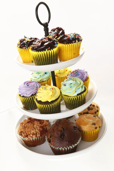 Trays of colorful assorted cupcakes — Stock Photo, Image