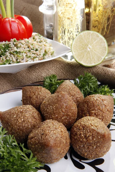 Fried Kibbe with Tabouli and Hummus Tahine — Stock Photo, Image